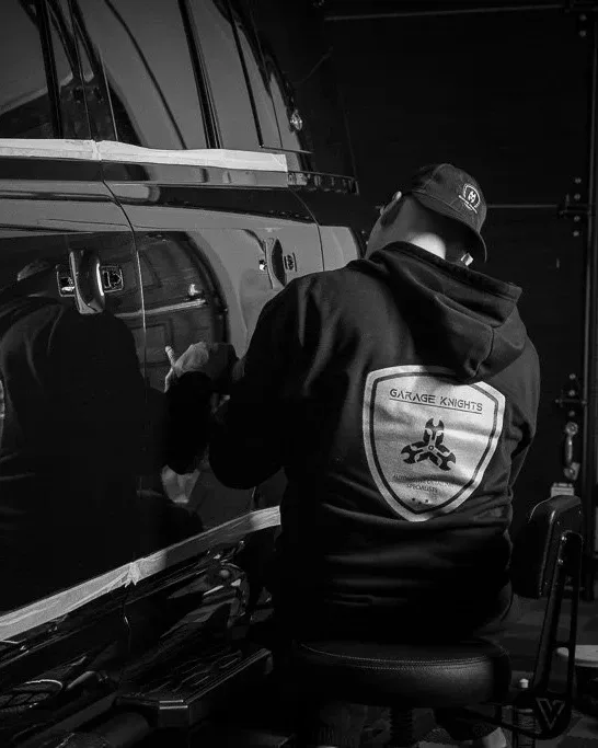 Kamil performing paint correction